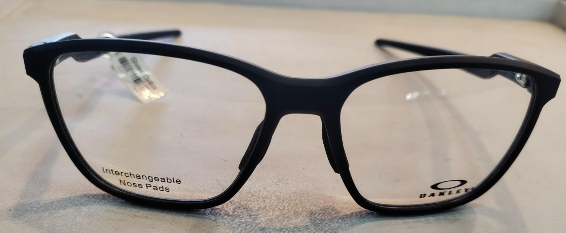 Matte black lightweight eyeglass frame with interchangeable nose pads
