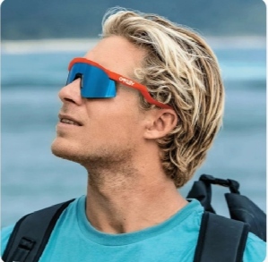 Customer wearing red Oakley sports sunglasses outdoors