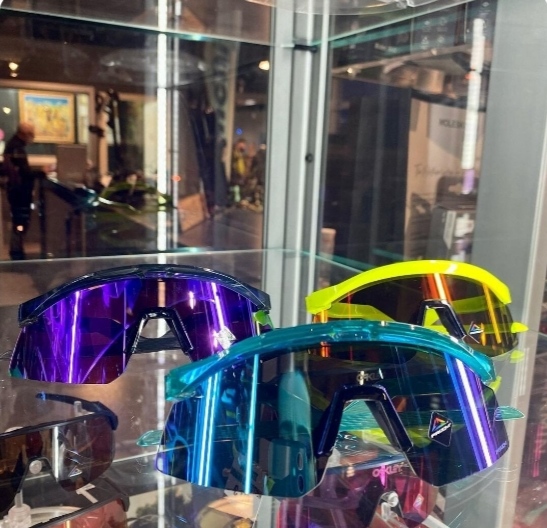 Oakley sunglasses collection displayed in store cabinet
