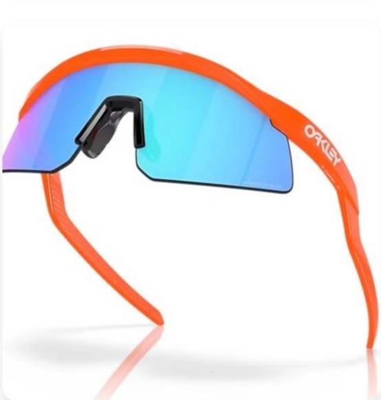 Orange Oakley shield sunglasses with blue mirrored lenses
