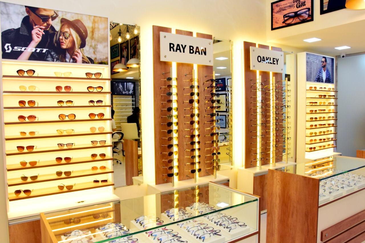 Ray-Ban and Oakley sunglasses display walls at Shree Optics Kharadi