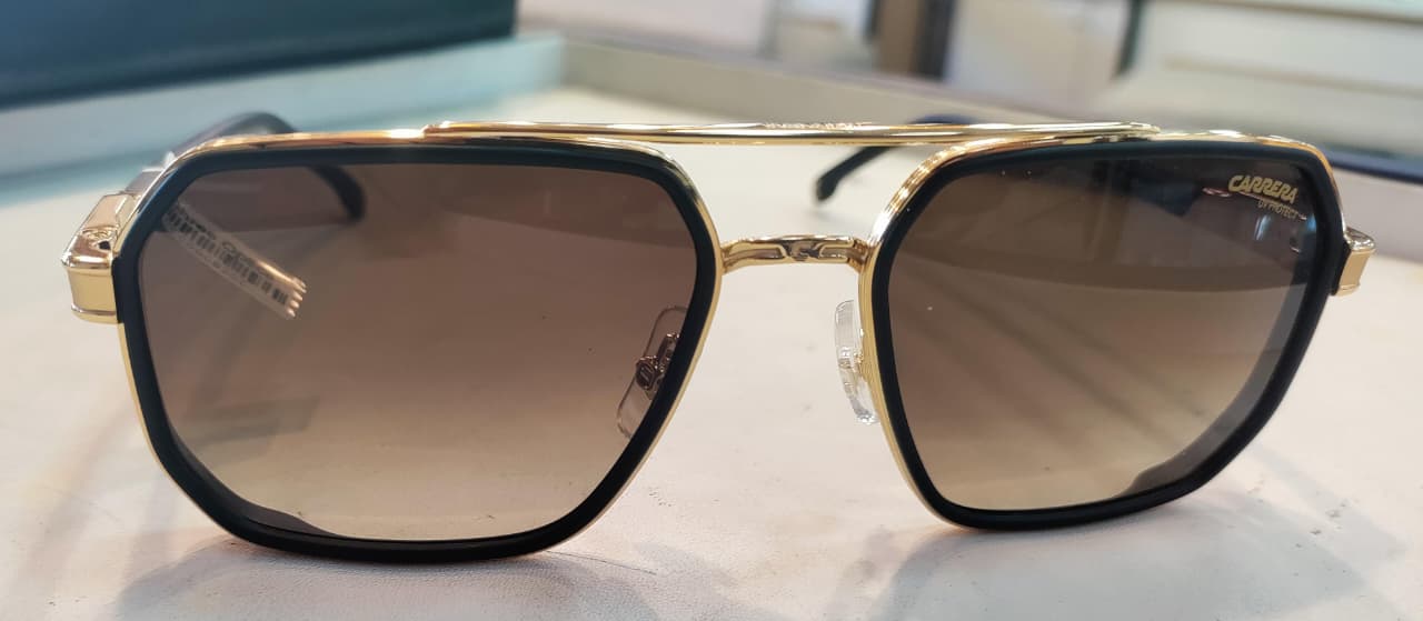 Front view of gold-rimmed square sunglasses with gradient lenses